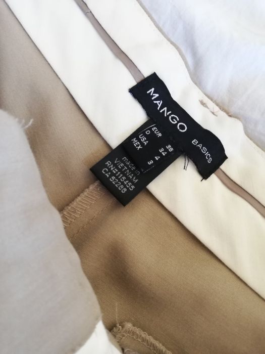 Calças de fato bejes Mango