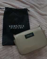 Oryginalna torebka Versace Parfums z torbą ochronną.