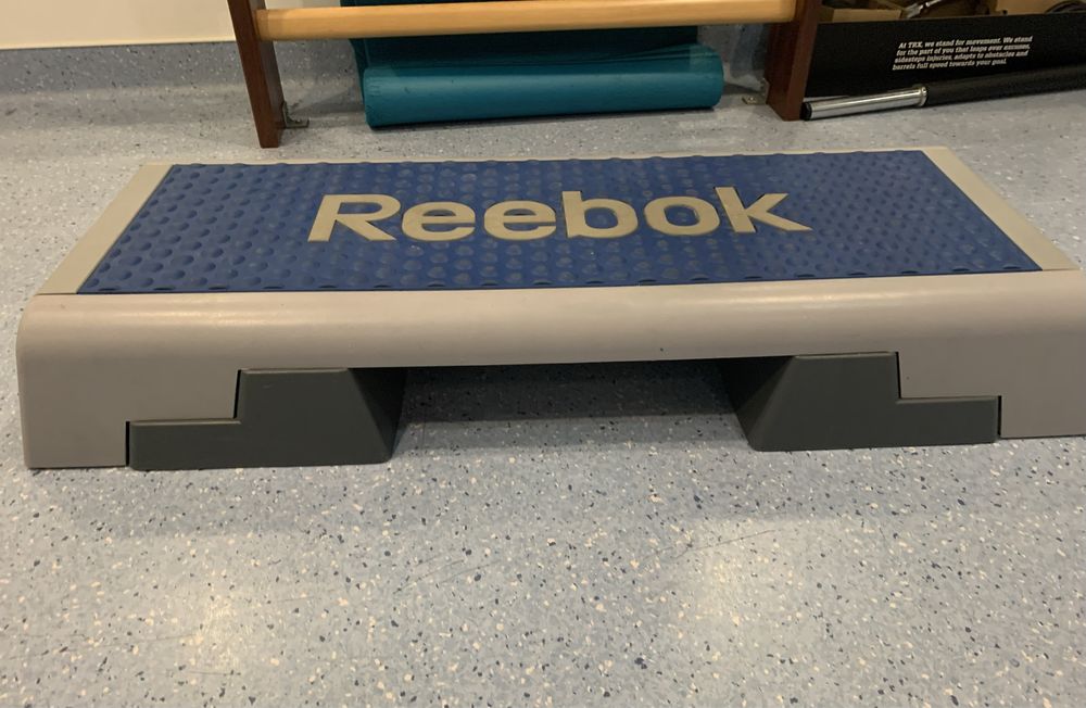 STEP Reebok.