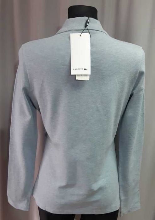 Поло голубое меланж Lacoste
