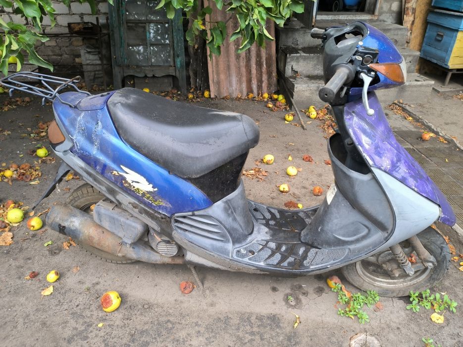 Скутер Suzuki синій