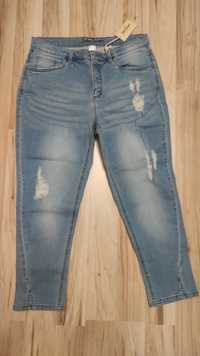 Cygaretki 44 spodnie jeansowe z przetarciami Nowe!