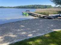 Domek nad jeziorem z wlasną linią brzegową