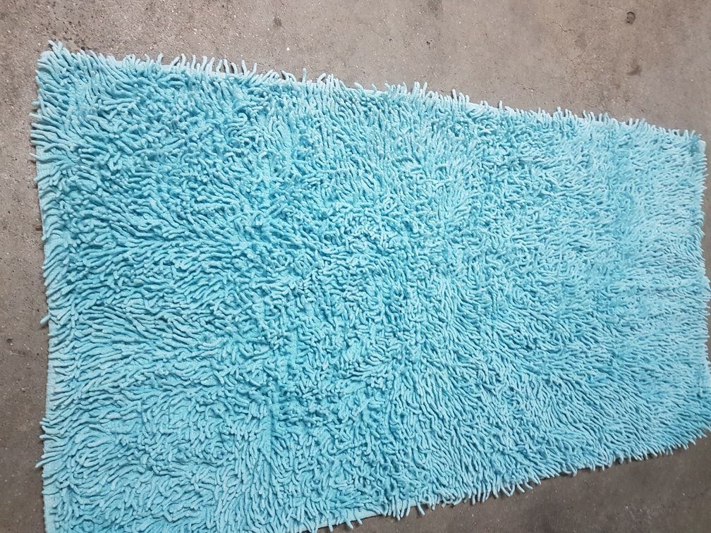Tapete azul  de casa de banho