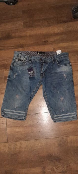 Нові джинсові шорти великого розміру