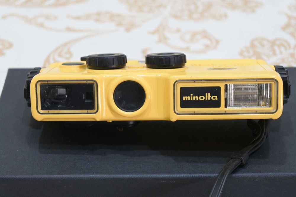 Máquina de coleção Minolta Weathermatic