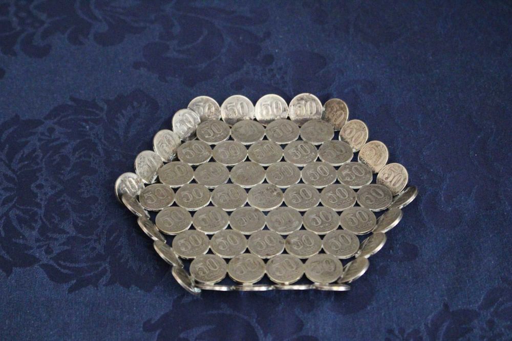 Despeja bolsos feito com antigos centavos brasileiras