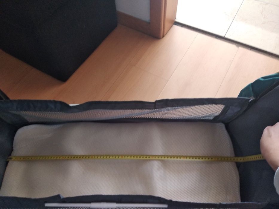 Mala com berço portátil