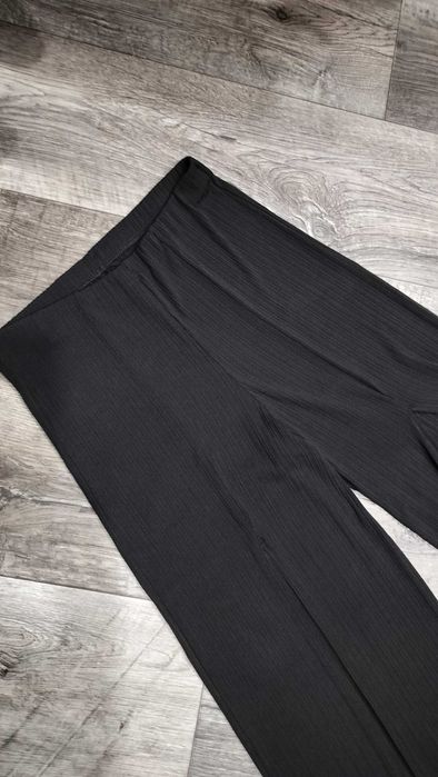 Штани-кльош із розрізами спереду