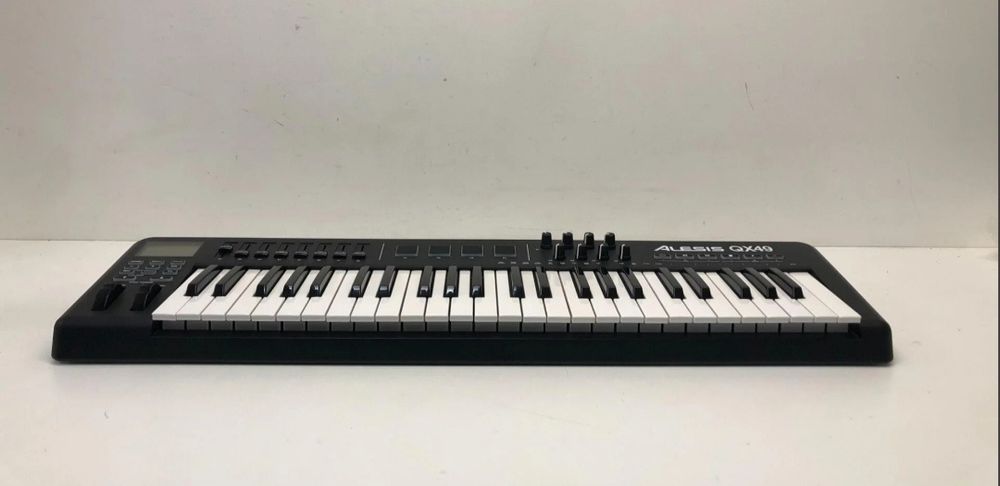 Міді клавіатура Alesis QX49 ідеал