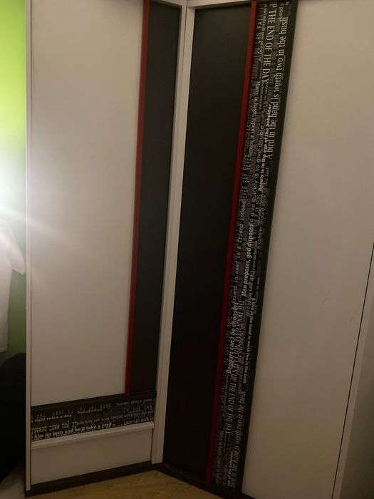 Dwie szafy z napisami młodzieżowe Agata meble stan bdb