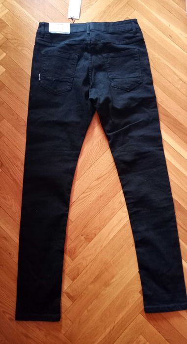 Spodnie jeansowe młodzierzowe z firmy Cropp Denim