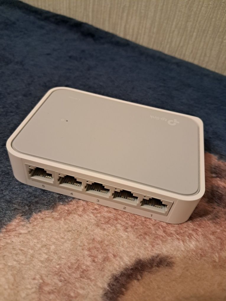 Коммутатор TP-LINK TL-SF1005D