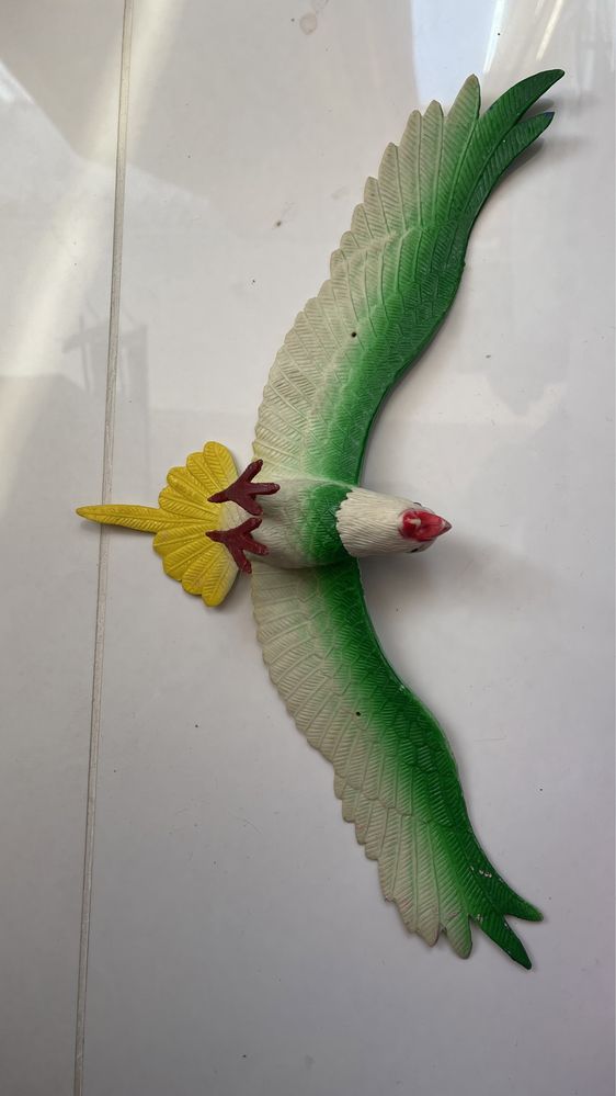 Детская игрушка резиновая попугай птица