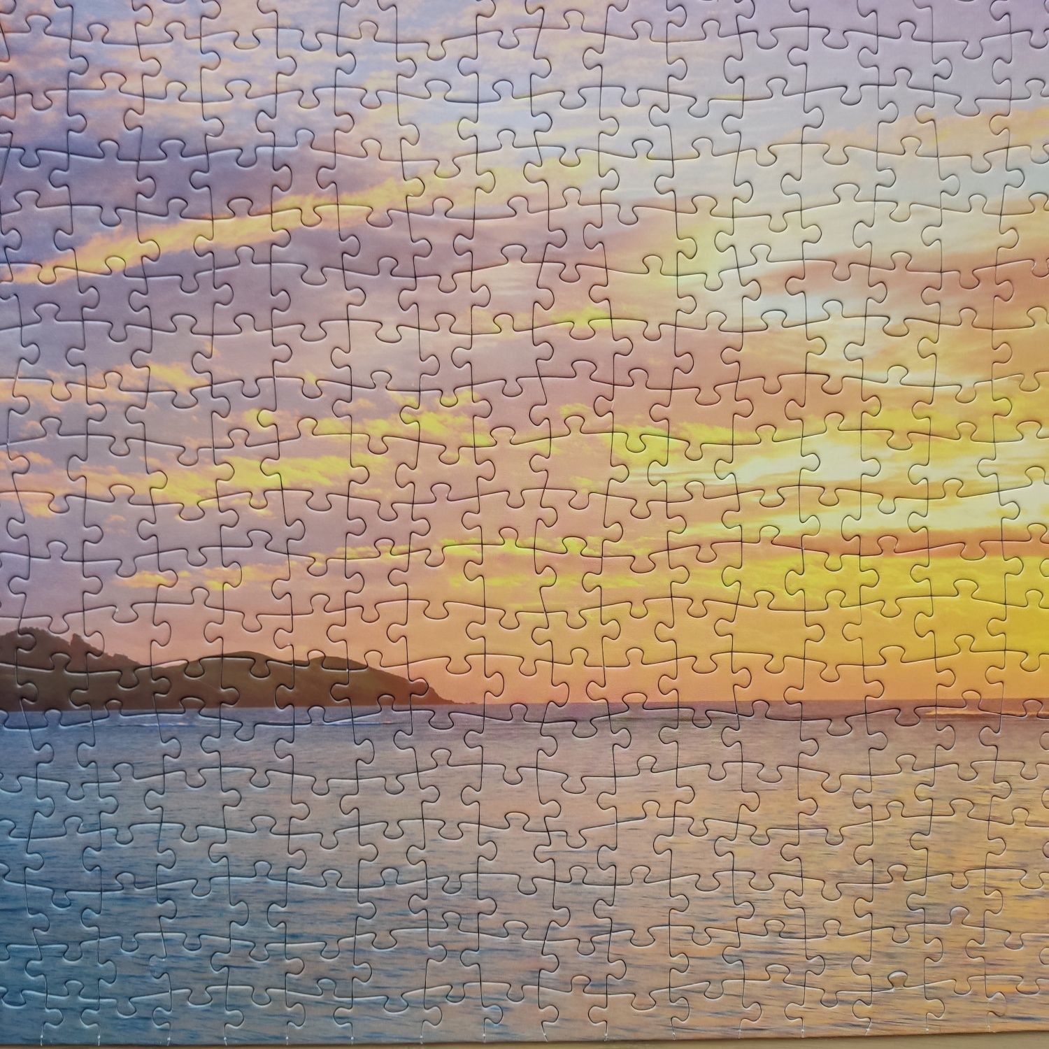 Puzzle Schmidt, 1000 el. (-1). Mark Gray. Zachód słońca, Fiji.