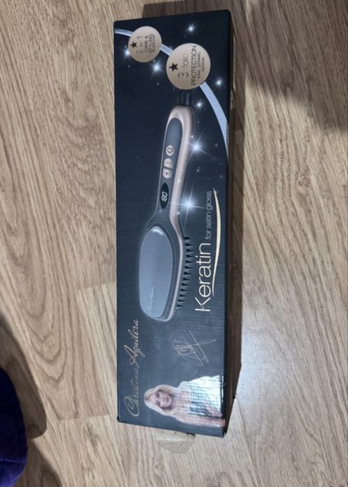 Escova de alisar o cabelo