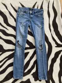 Spodnie jeansy dzinsy rurki slim skinny z dziurami biodrowki