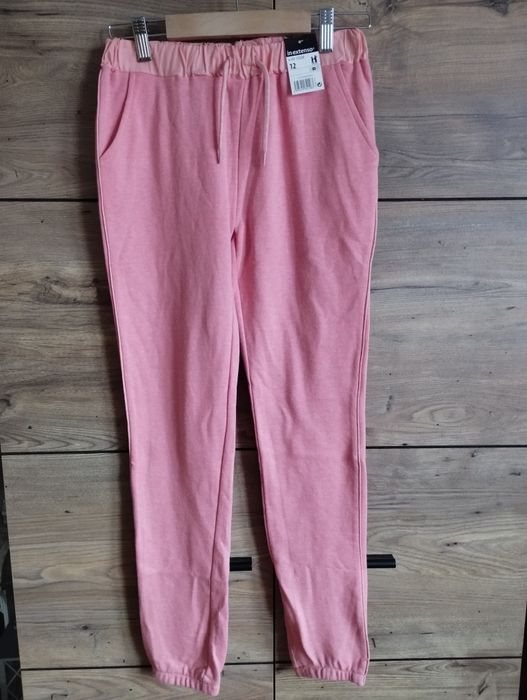Spodnie dresowe in extenso 152 różowe nowe z metką