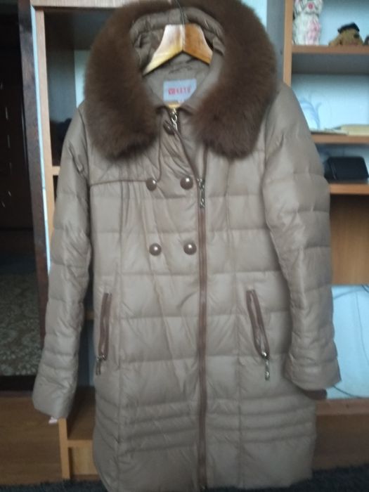 Продам теплый пуховик.