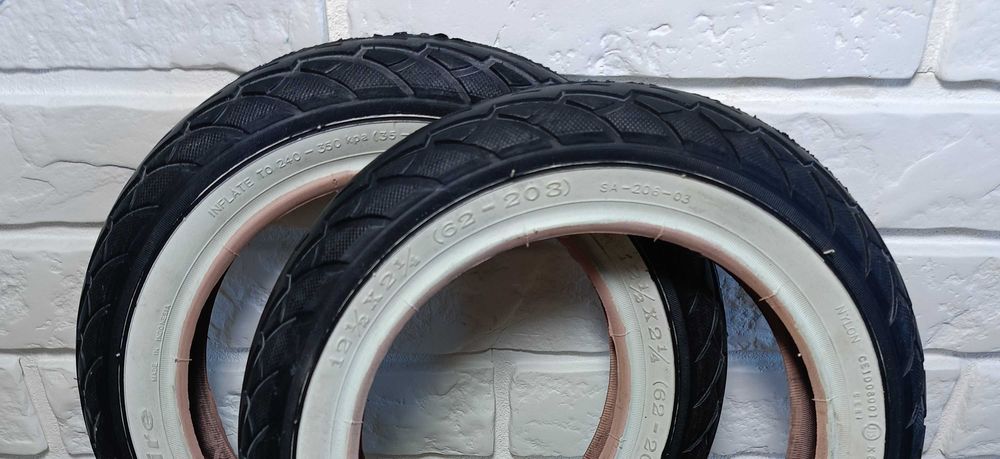 Opona  do wózka, rowerka DELI SA-206 12 1/2 x 2 1/4 biały bok