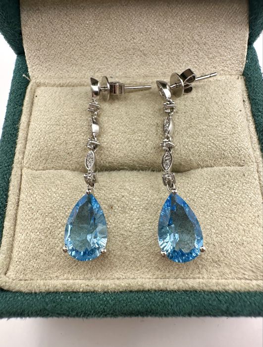 Złote kolczyki 585 z topazami 3,40ct i diamentami 0,18ct Si1/J