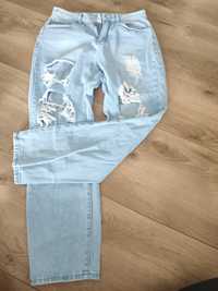 Spodnie jeans z dziurami rozmiar M