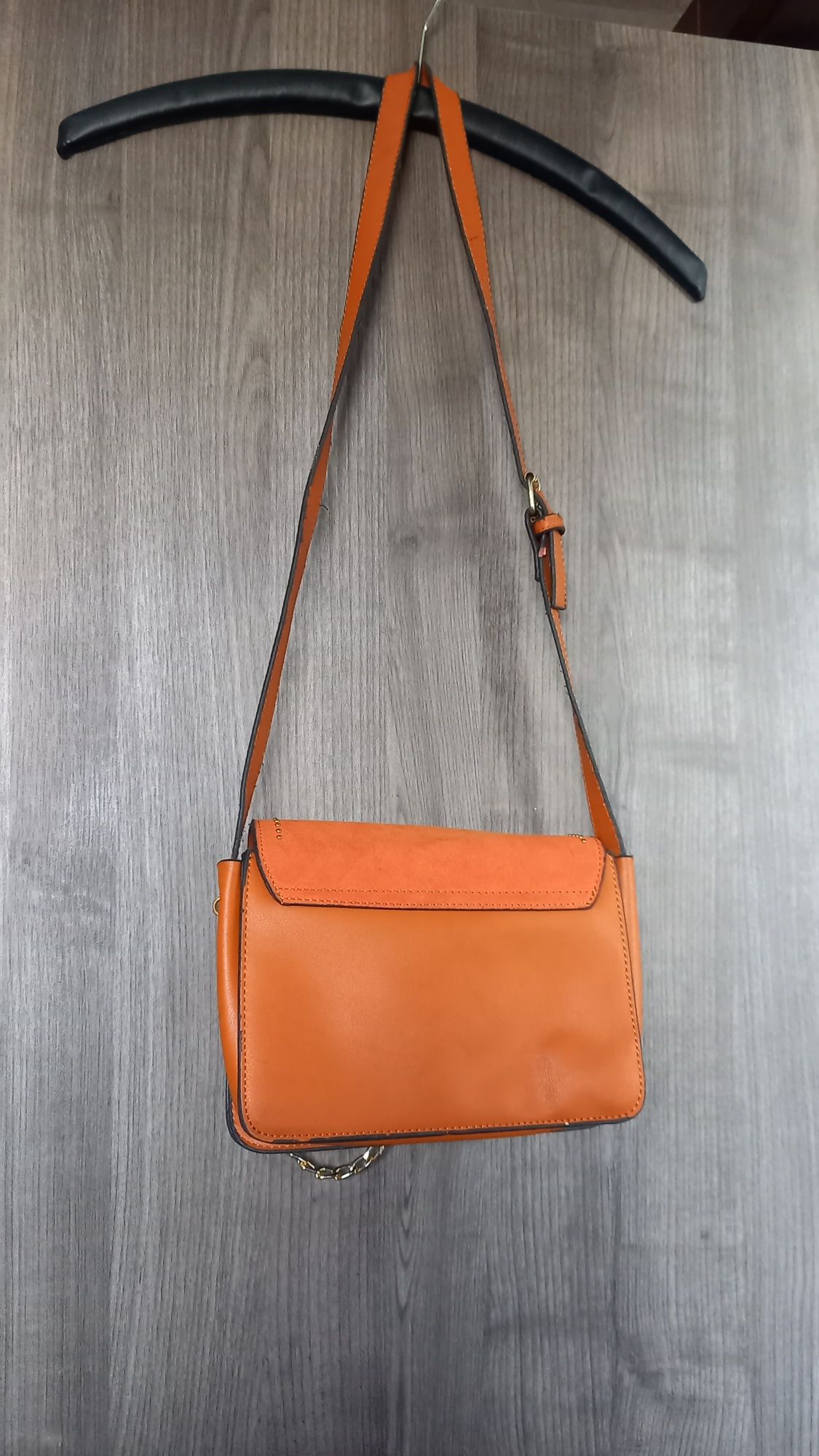 Bolsa  tiracolo   .