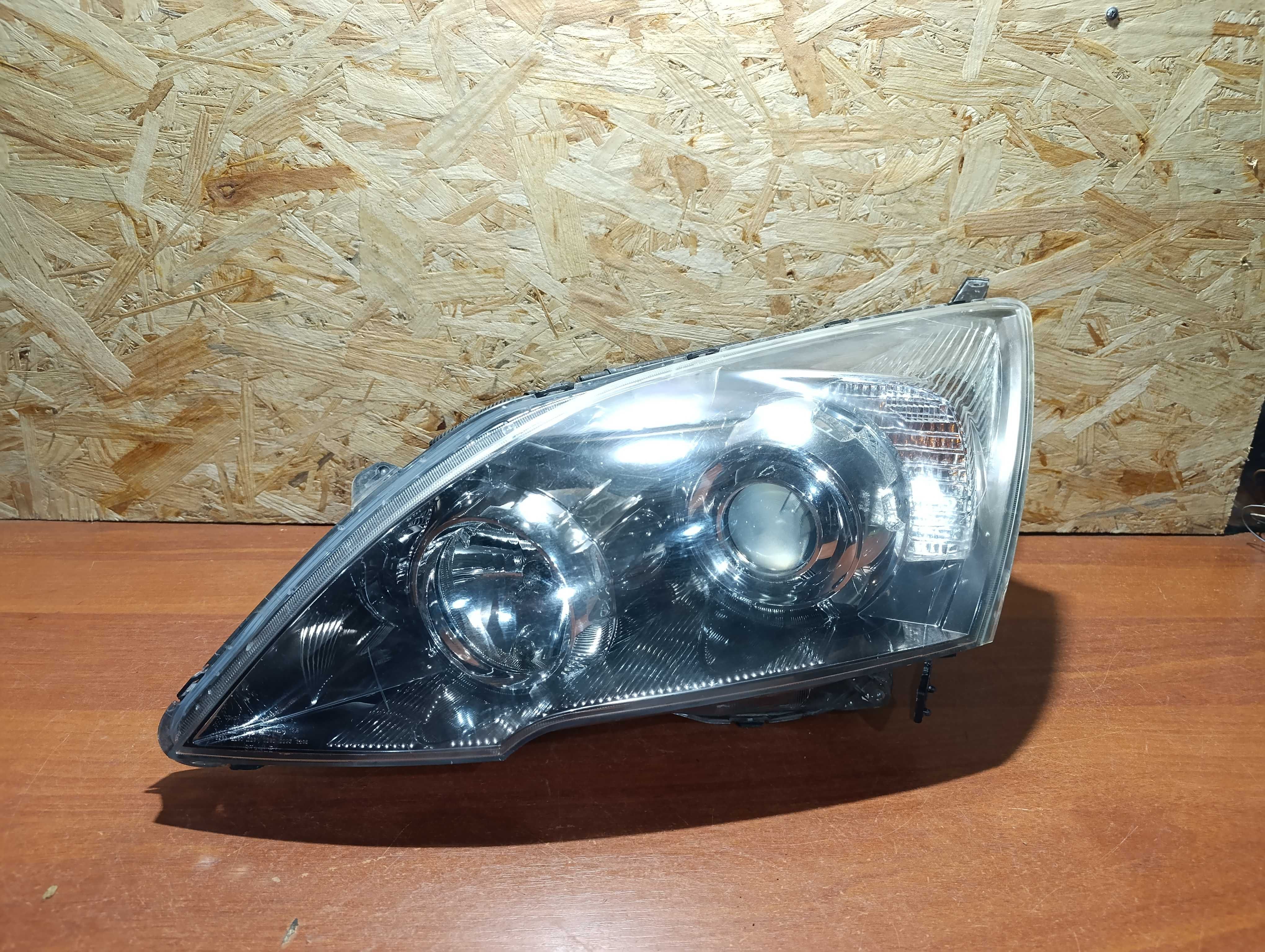Фара левая галоген Honda CR-V 3 дорестайлинг 2007-09г.в.