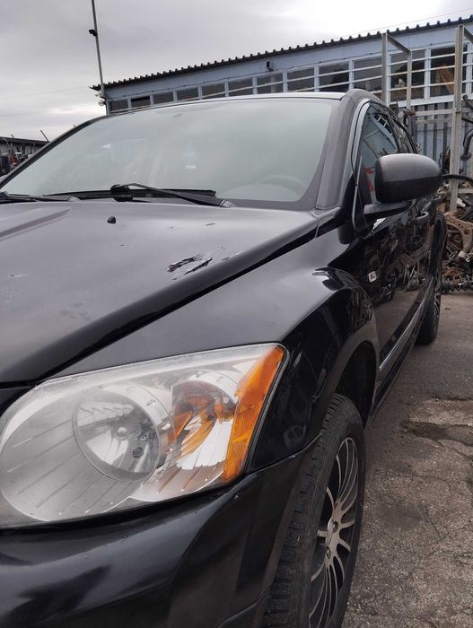 Dodge Caliber 2.0CRD 2006r.Błotnik przedni lewy.