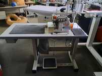 Máquina de costura com corte automático