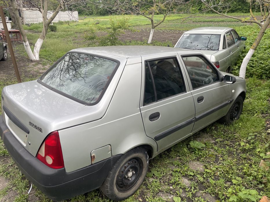 Dacia Solenza двері багажник бампер крило мотор стартер РОЗБОРКА