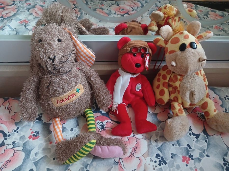 Ведмідь середня ,м'яка  нова іграшка.