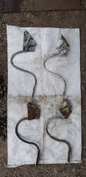 Кронштейн капота газель