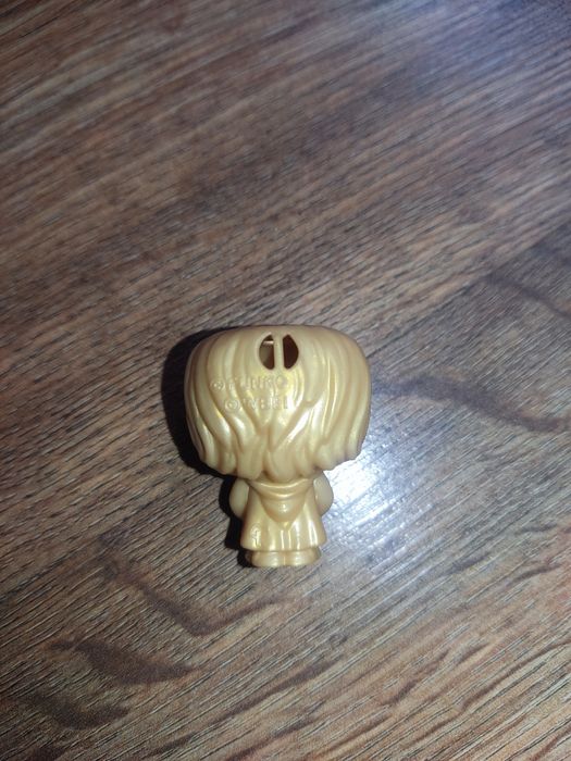 Золота колекційна фігурка Гаррі Поттера