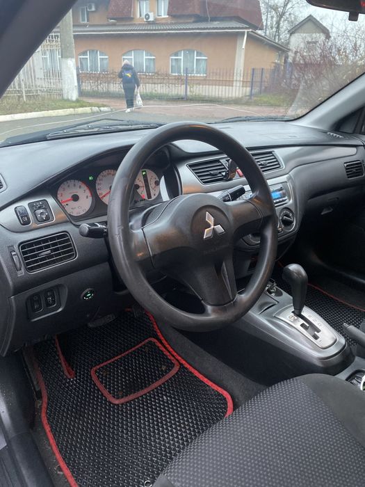 Mitsubishi Lancer 9 1.6 газ4 автомат