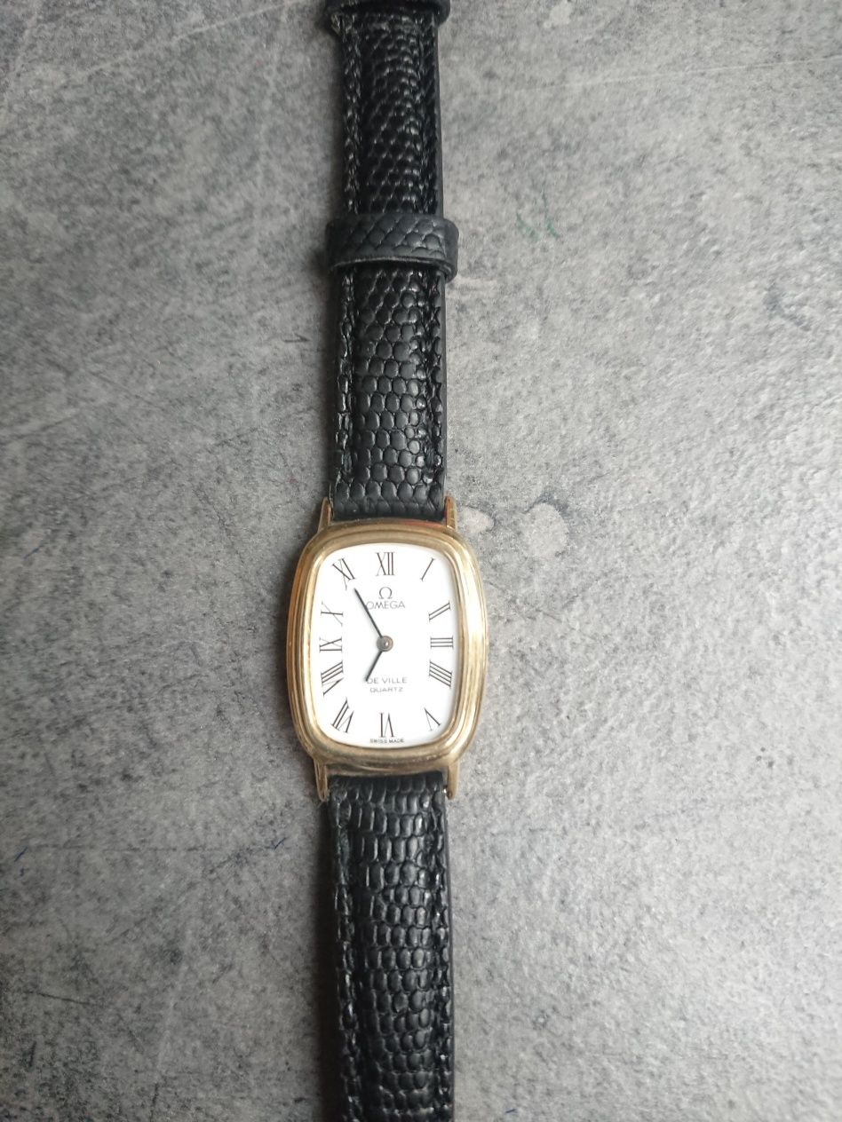 Złoty zegarek Omega pr. 750