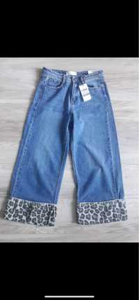 Nowe spodnie dzwony jeans stradivarius