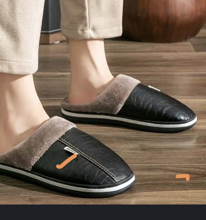 Продам мужские теплые тапочки размер на  42-43.