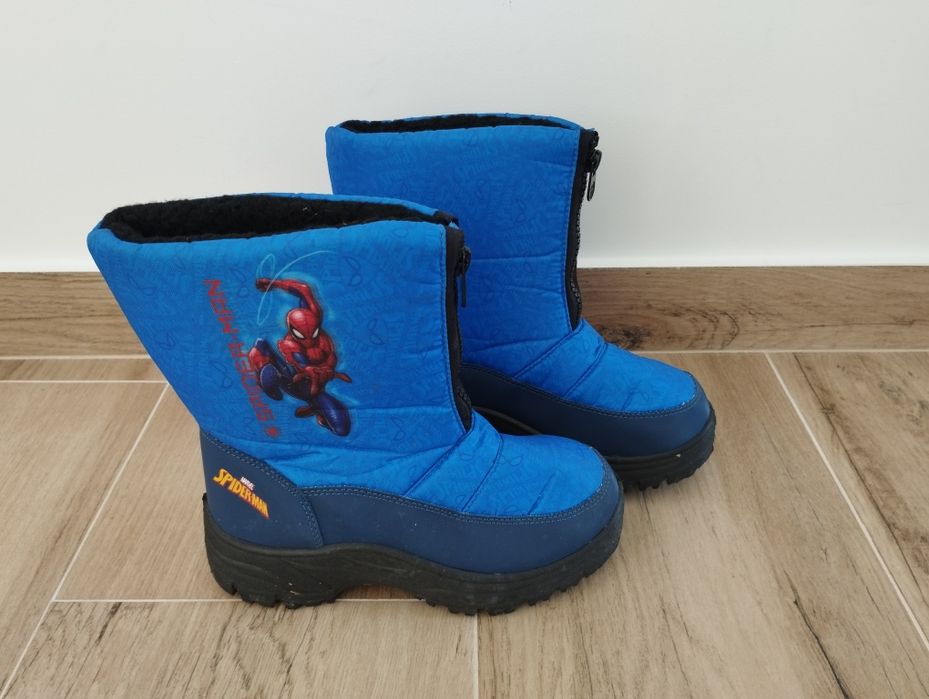 Botas de neve de criança