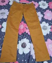 Spodnie pomaranczowe L