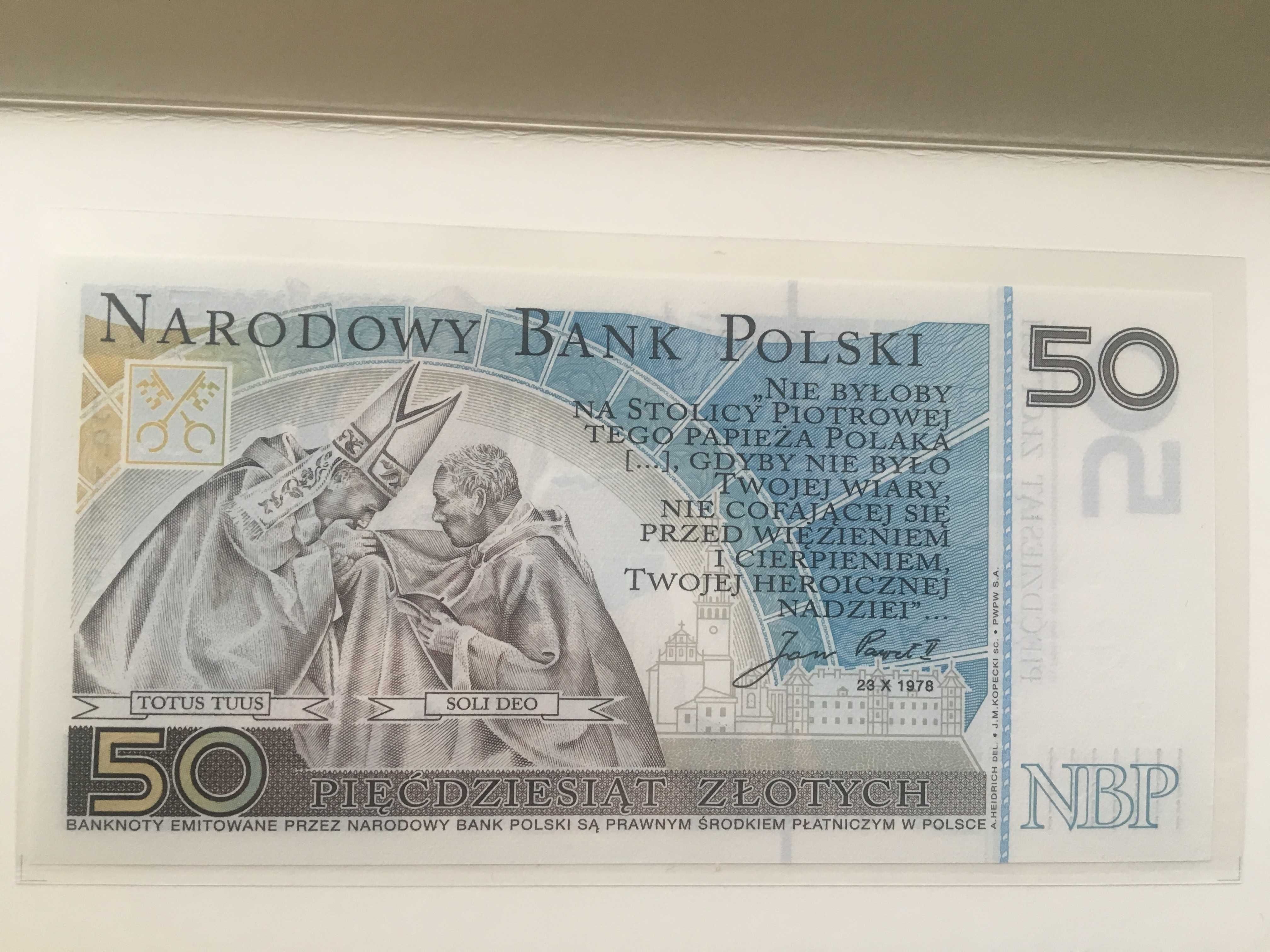 7 szt banknotów 20 i 50 zł w folii bankowej.
