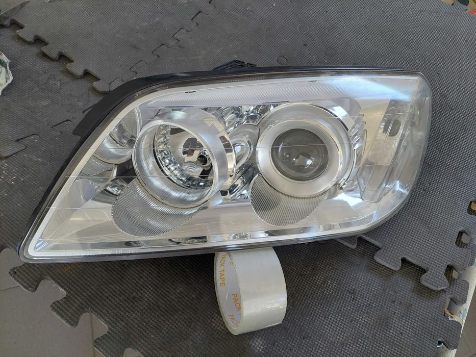 farol esq Chevrolet captiva