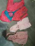Casacos de criança, camisolas, vestidos e calças