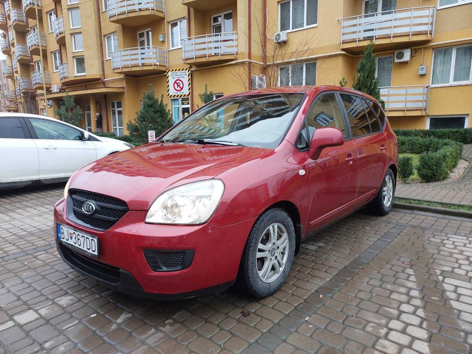 Kia Carens 2008 капот фара