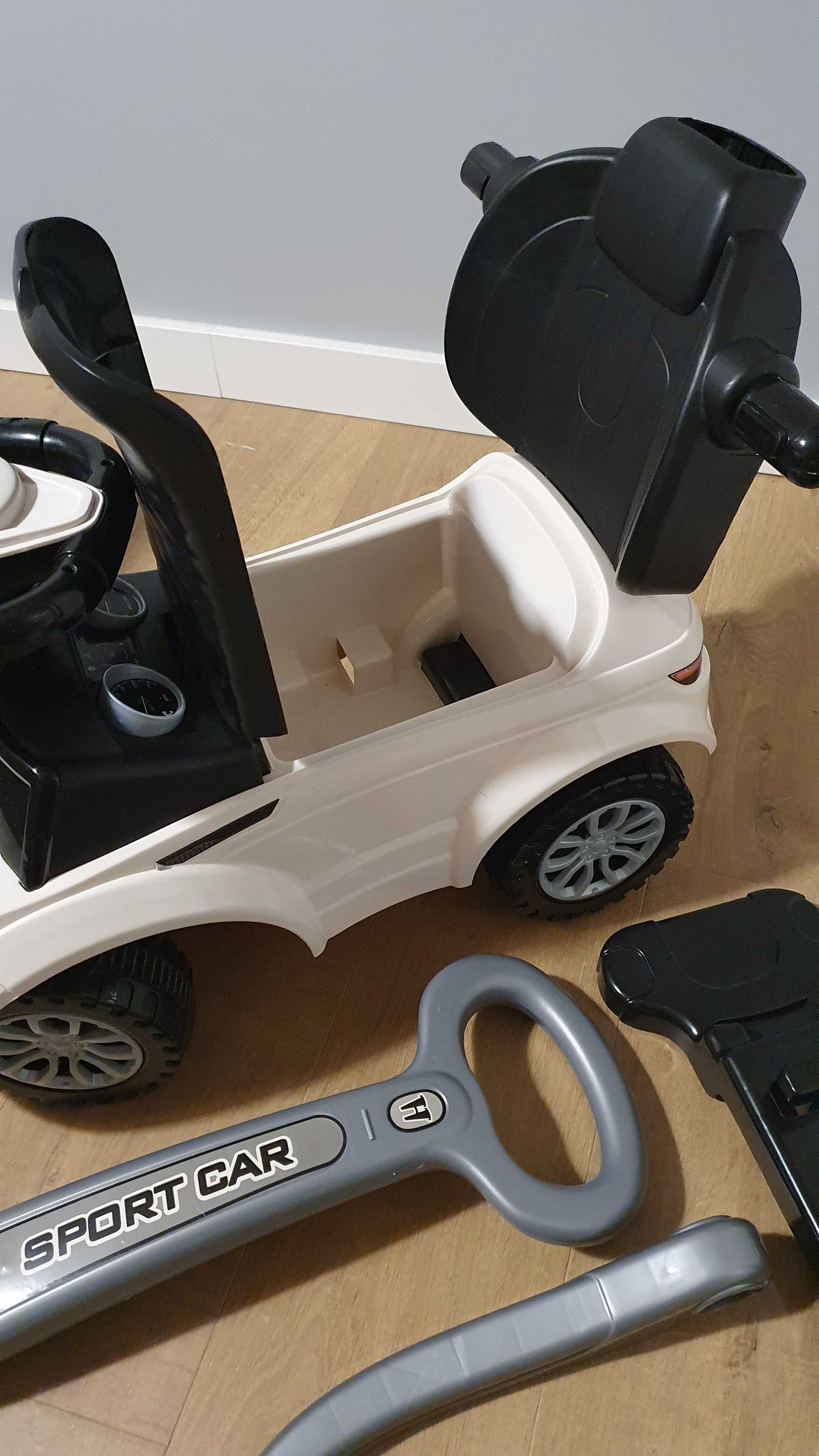 Jeździk Sport Car 614W biały, otwierane siedzisko