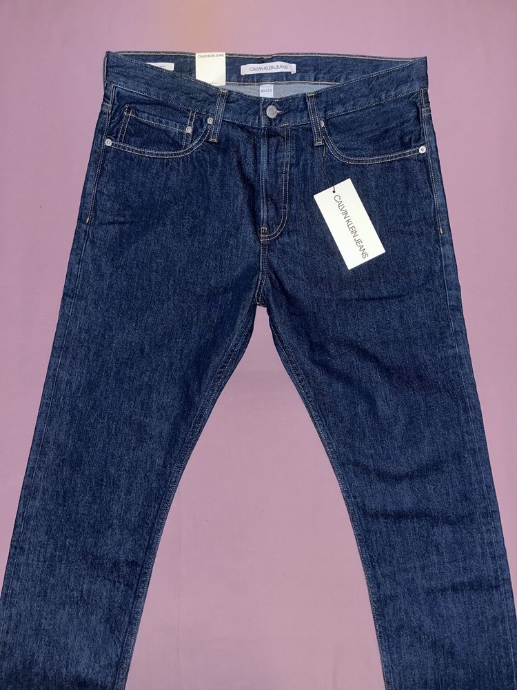 Wyprzedaż spodnie męskie Calvin Klein Jeans.