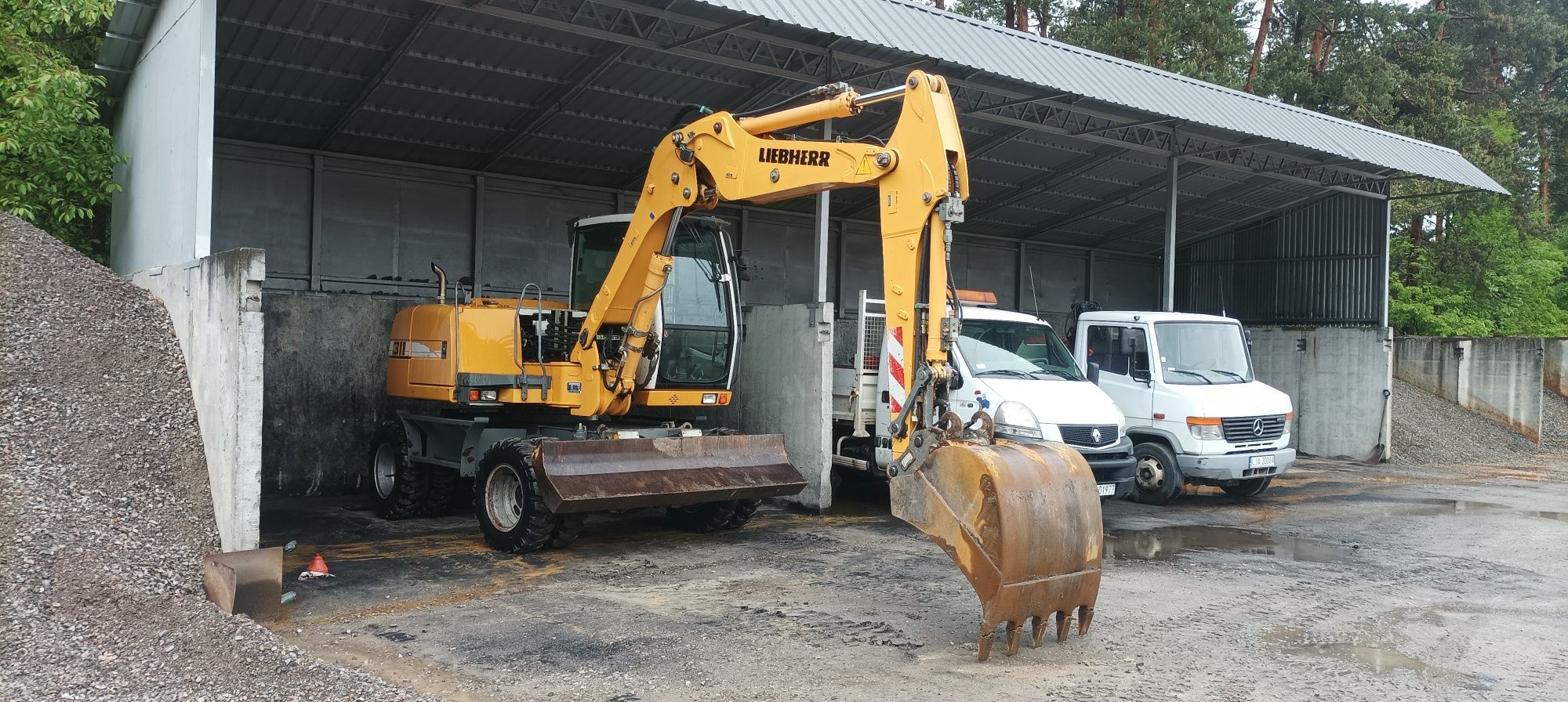 Liebherr 311 pług podpory