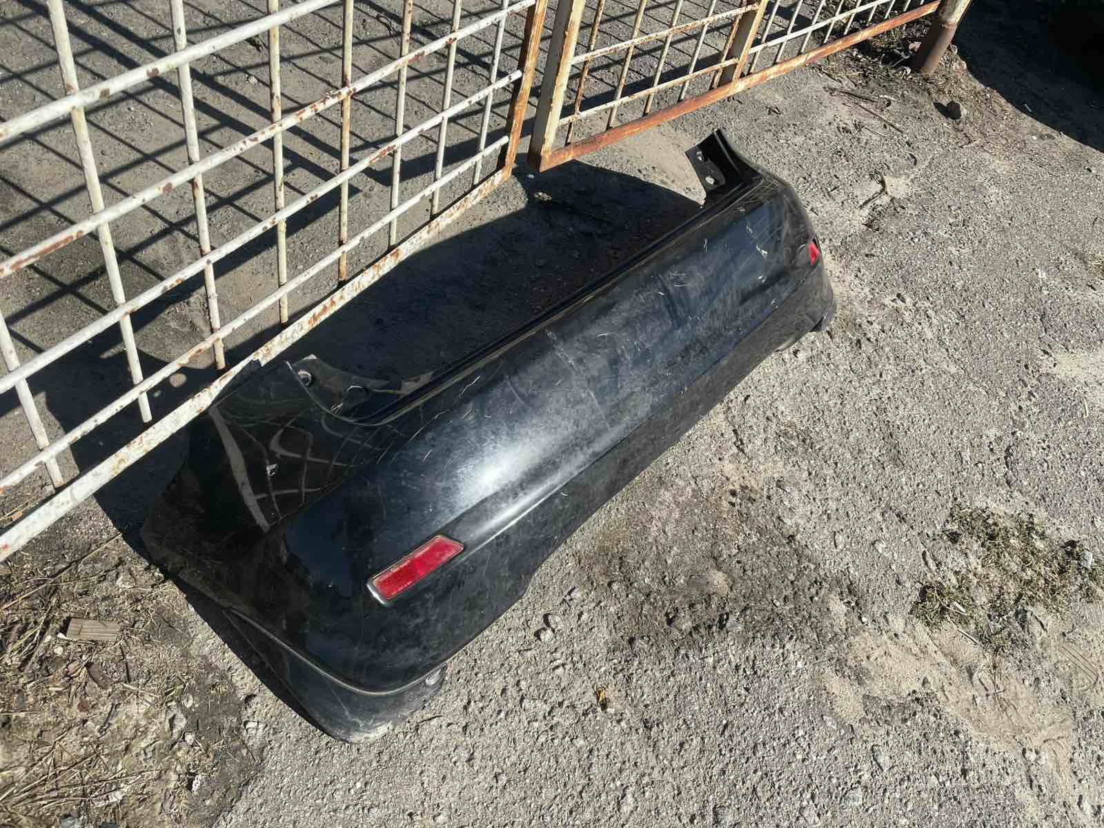 Задний бампер Nissan Note 2012 E11