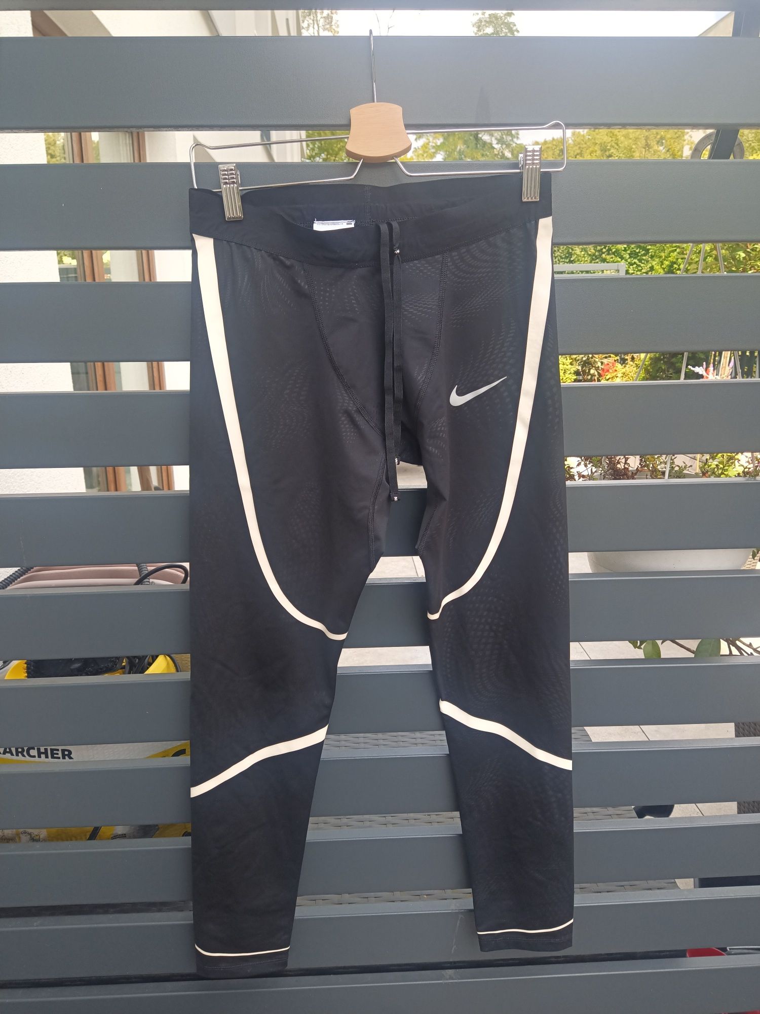 Nike running legginsy damskie