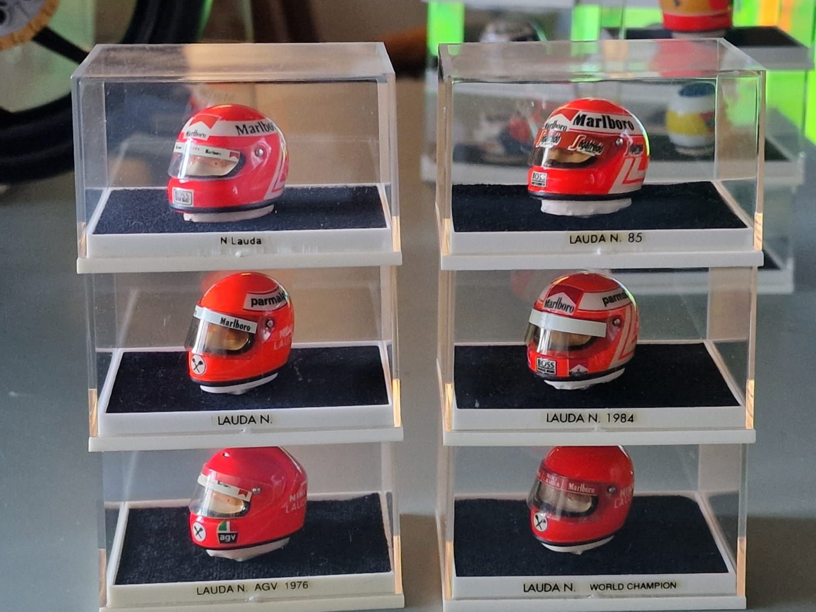 Capacetes do Alain Prost, Niki Lauda, Michael Schumacher e Alonso